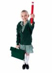 School Girl Holding Bag And Pencil Stock Photo