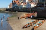Whitby, North Yorkshire/uk - August 22 : Rowing Boats Beached On Stock Photo