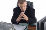Thinking Businessman In Office Stock Photo