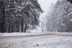 Snowfall And Sleet On Winter Road. Ice Snowy Road. Winter Snowst Stock Photo