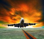 Jet Plane Flying Over Runways And Beautiful Dusky Sky With Copy Stock Photo