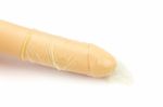 Model Of Human Penis Wearing Rubber Condom On White Stock Photo