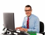 Happy Young Corporate Man Using Computer Stock Photo