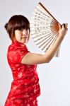 Chinese Model In Traditional Cheongsam Dress Stock Photo