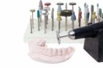 Old Grunge Micromotor Dental Lab And Mould Of Teeth Stock Photo