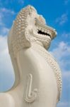 Thai  Style Lion Statue In Blue Sky Stock Photo