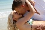 Caucasian Couples Kissing Stock Photo