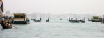 Gondoliers Ferrying Passengers Along The Grand Canal Of Venice Stock Photo