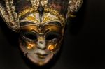 Masks And Feathers Of Venice Carnival On Black Background Stock Photo