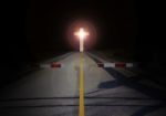 Cut Barrier On Road With Crucifix Light In Darkness Stock Photo