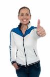 Joyous Woman Showing Thumbs Up Gesture Stock Photo