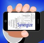 Synergize Word Shows Work Together And Collaboration Stock Photo