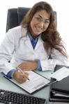 Smiling Adult Doctor In Clinic Stock Photo