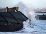 Hopton-on-sea Norfolk Uk March 2014 - Sea Defences Taking A Batt Stock Photo
