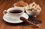 Cup Of Coffee And Sugar Cinnamon Stick Stock Photo