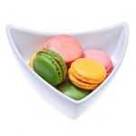 Colorful Macaroons In A Bowl Stock Photo