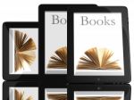 Tablet Computer With Books Stock Photo