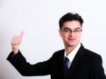 Business Man Fining Thumbs Up Stock Photo