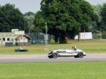 Vintage Car Driving Around Dunsfold Airfield Stock Photo