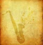 Saxophone On Old Paper Stock Photo