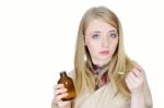 Young Woman Taking Syrup Stock Photo