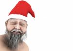 Old Man In Santa Claus Hat Stock Photo