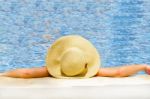 Woman In Hat Relaxing On Holiday Stock Photo