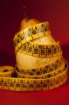 Pear With Measuring Tape Stock Photo