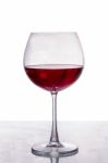 A Glass Of Red Wine Isolated On White Background Stock Photo