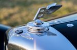 Close-up Of A Bentley Emblem Stock Photo