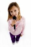 Girl Singing On Microphone Stock Photo