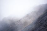 View Of Mountain Forests Covering By Fog For Background Stock Photo