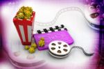 A Movie Reel With Clapboard And Popcorn Stock Photo