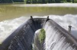 Water Flowing From Dam Stock Photo