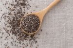 Chia Seeds In Wooden Spoon Top View Stock Photo