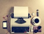 Typewriter And Personal Items On The Table Stock Photo