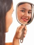Girl Looking In Mirror Stock Photo