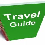 Travel Guide Book Represents Advice On Traveling Stock Photo