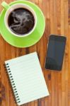 Cup Smart Phone And Book Stock Photo