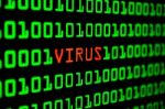 Close Up Of Binary Code Infected By Computer Virus Stock Photo