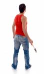 Back Pose Of Man With Hammer Stock Photo