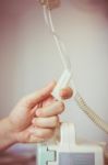 Nurse's Hands Regulation An Intravenous (iv) Drip In Hospital Ro Stock Photo