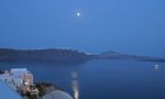 Moonrise Over Santorini Stock Photo