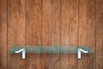 Glass Shelf On Wooden Texture Background Stock Photo