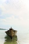 Fishing Boat Anchored On The Shore Stock Photo
