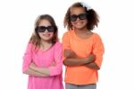 Two Little Girls In Black Sunglasses Stock Photo