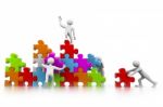 Building Puzzles Together Stock Photo