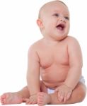 Cute Baby Boy In Diaper Looking Away Stock Photo