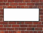 Sign On A Brick Wall Stock Photo