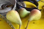 Pears On A Table With Working Tools Stock Photo